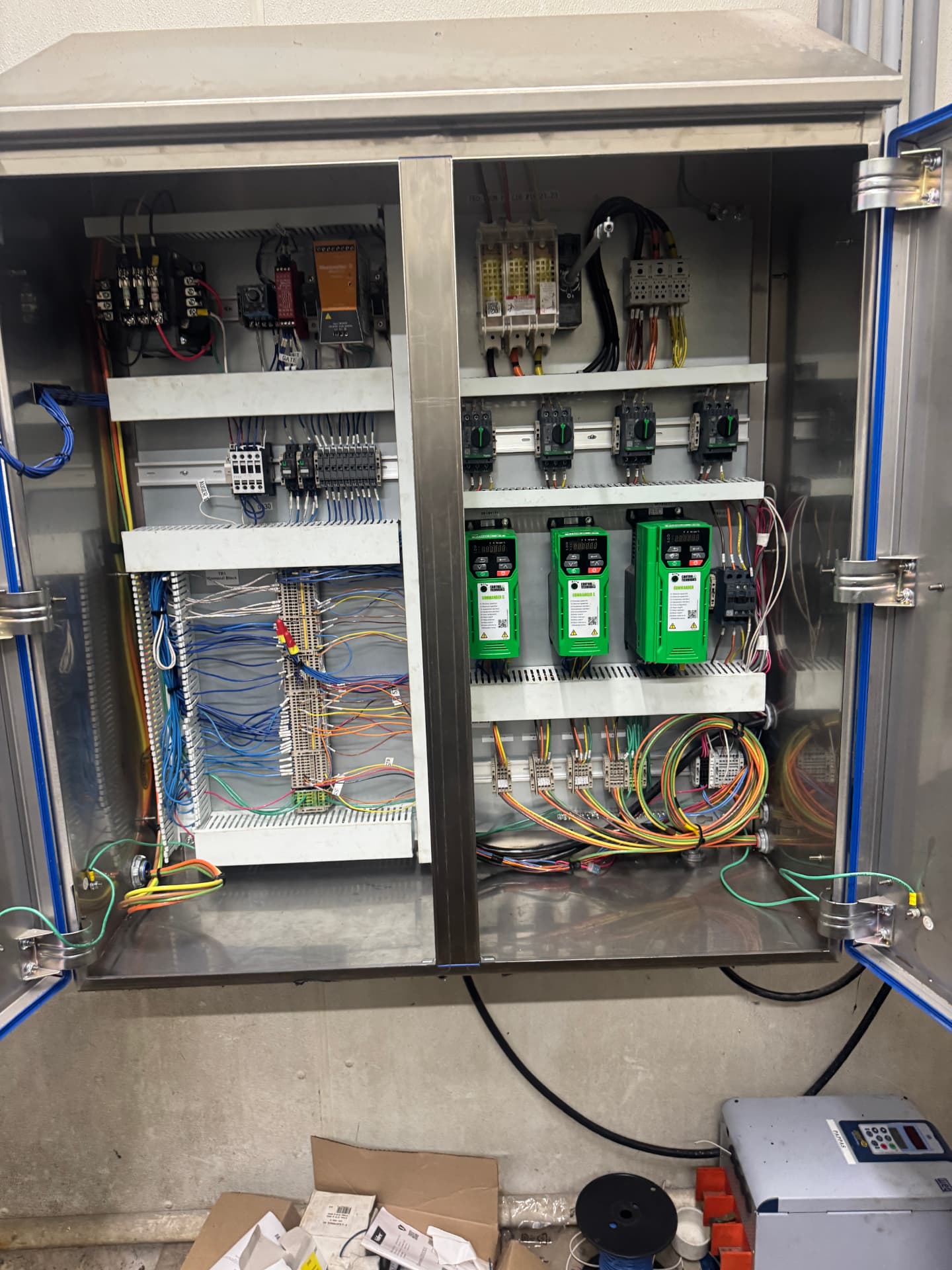 Stainless control enclosure with Control Techniques Commander VFDs, Schneider breakers and safety relay